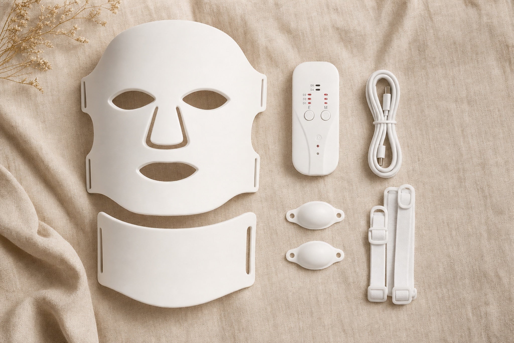 Redermis kit contents: mask, neck panel, eye patches, straps, remote and USB-C cable [white]